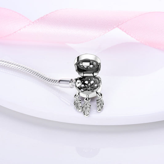Dreamcatcher bracelet inlaid with colored gemstones