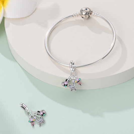 Eiffel Tower, floral guitar and bouquet triple pendant