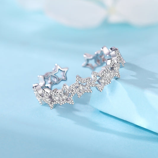 Adjustable ring with openwork star design