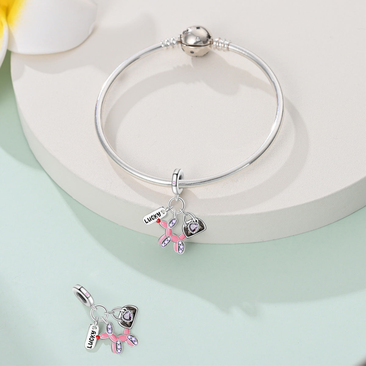 Balloon puppy, heart bag and LUCKY tag triple charm