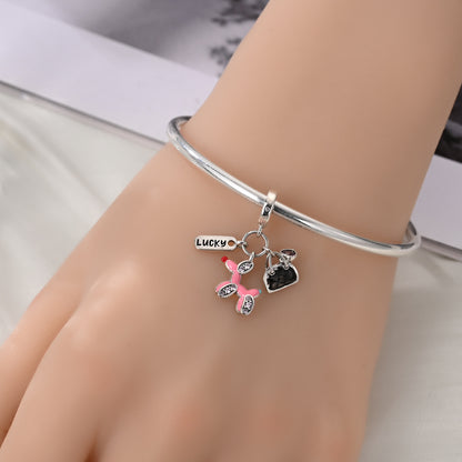 Balloon puppy, heart bag and LUCKY tag triple charm